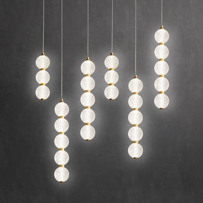 Modern Style Acrylic And Brass Chandelier For Homes And Commercial Spaces